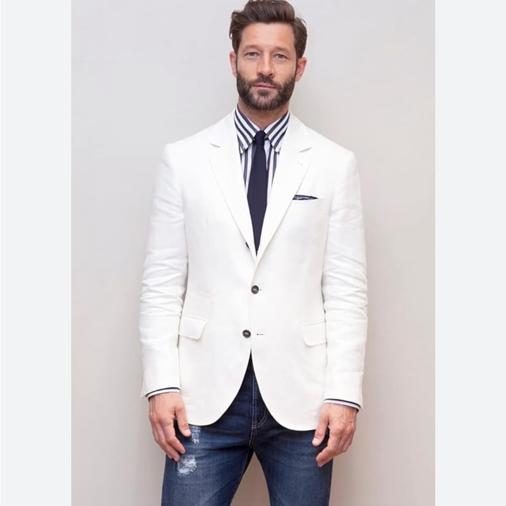 Beige colored, medium sized, Blazer. In PERFECT condition.